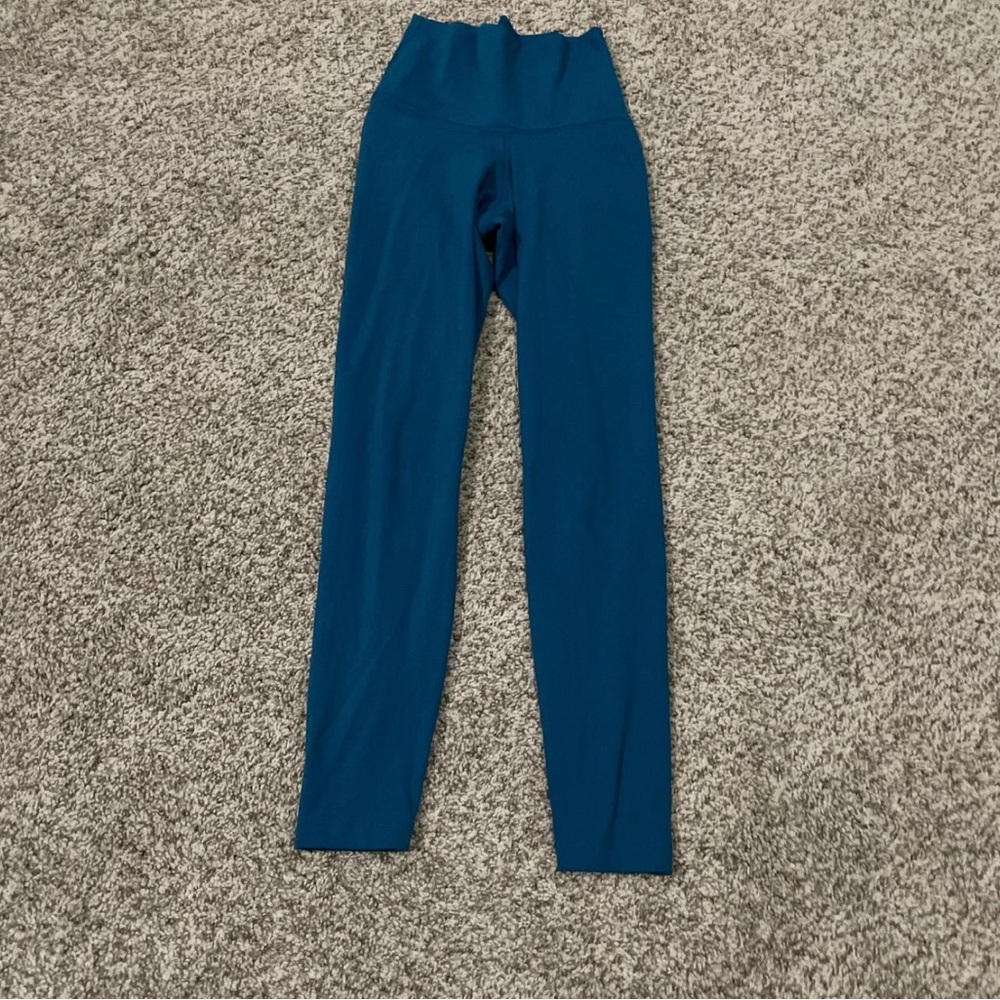 Nike Teal blue high-waisted leggings.  Look and feel just like lulu